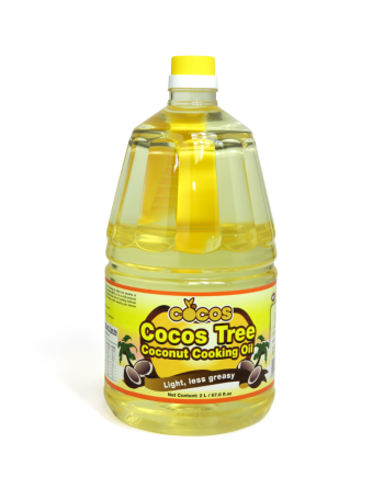 A bottle of coconut cooking oil, known for its health benefits and versatile uses in culinary applications. It is a clear liquid with a rich, tropical aroma, extracted from the flesh of mature coconuts.