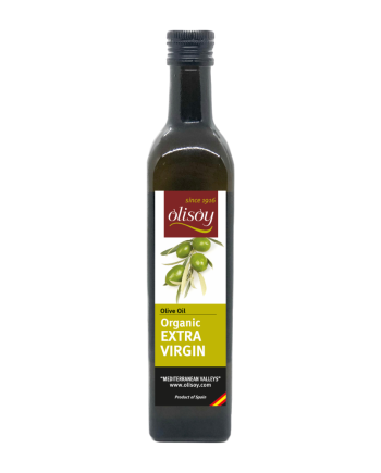 Glass bottle of golden-hued organic extra virgin olive oil, radiating freshness and purity from nature's bounty.