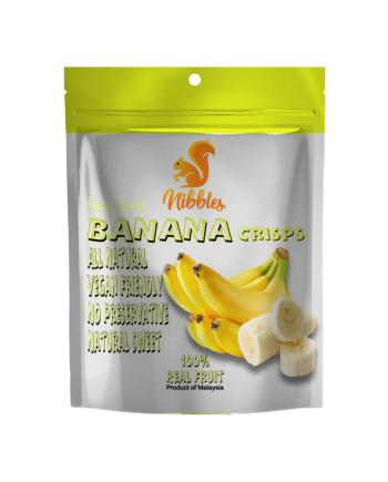 A close-up view of freeze dried bananas, showcasing their golden color and crispy texture. The lightweight and portable snack is presented in a clear container, inviting you to enjoy the natural sweetness of this wholesome and convenient treat.
