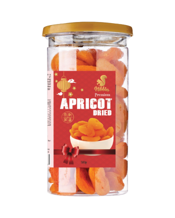 A close-up view of plump, dried apricots, their golden, wrinkled skin glowing with concentrated sweetness. These Anatolian delights, naturally rich in nutrients and bursting with honeyed flavor, are a taste of sunshine from Turkey's fertile valleys.