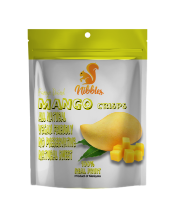 Crispy, freeze dried mango slices arranged on a white background.
